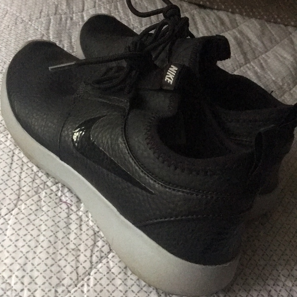 Chic all black leather Nike shoes